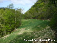 An area re-contoured to resemble a wagon trail. - National Park Service Photo